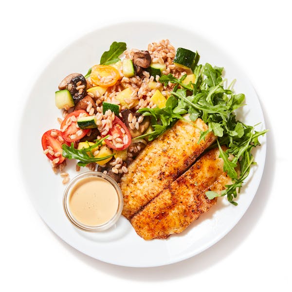 Lemon Baked Tilapia with Cajun Cream Sauce