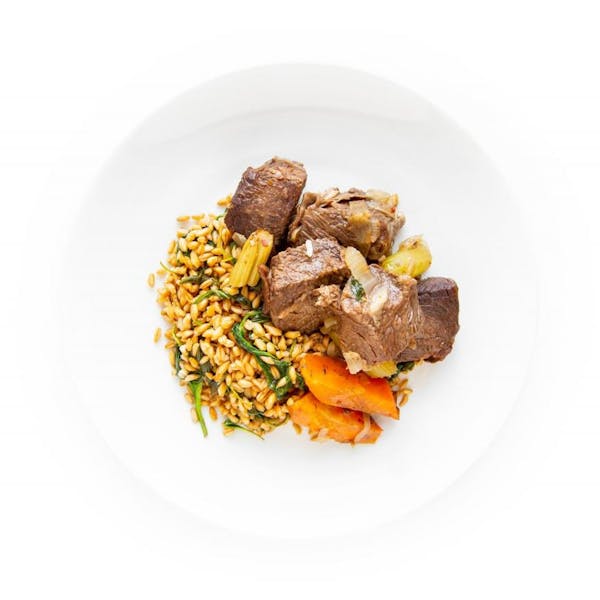 Baharat Braised Short Ribs with Freekeh and Prune Sauce