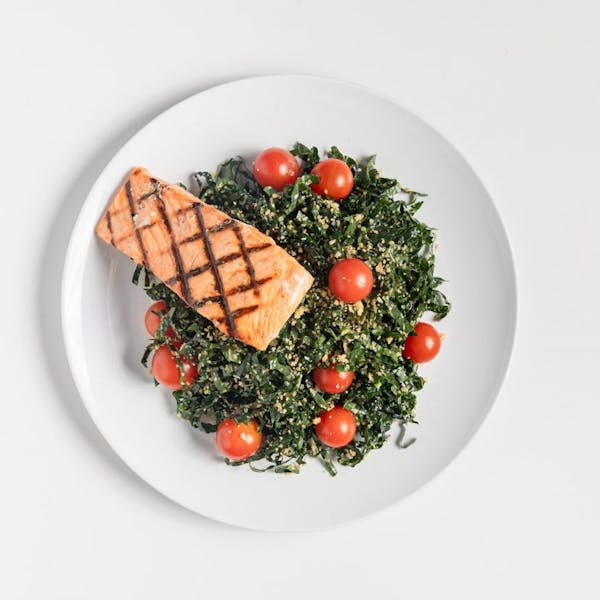 Grilled Salmon over Kale Salad